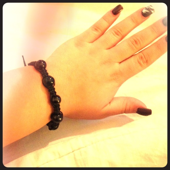 Hand made bracelet with black silver & gold beads