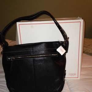 Coach Leather Duffle - adjustable strap.  .