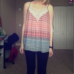 orange and blue tank top