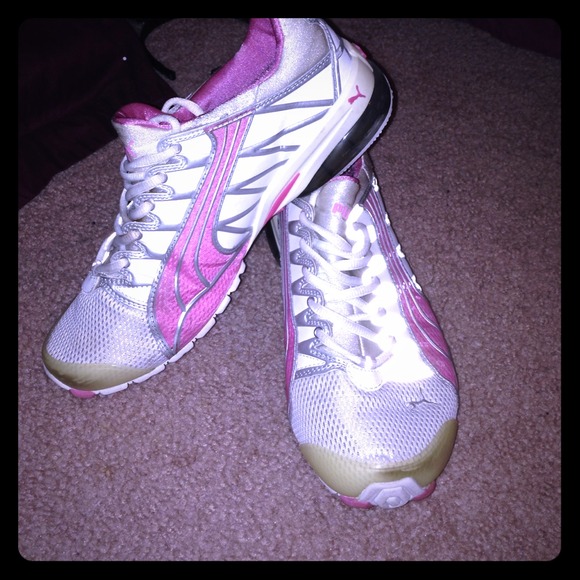 White puma running shoes