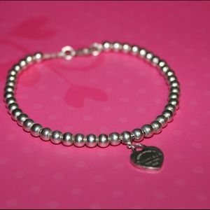 Authentic Tiffany & Co heart charm beaded bracelet