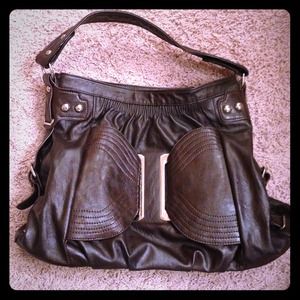 Brown purse with strap, zip closure, & inside zips