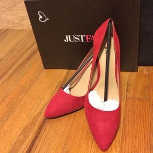 Red suede pointy toe pumps