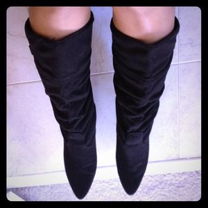 Black suade slouchy boots.