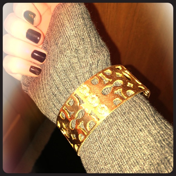 Gold coach bracelet