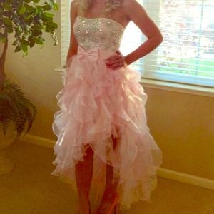 Stunning pink high low dress by Dave and Johnny.