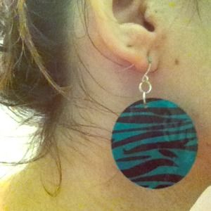 Circular teal and black zebra earrings