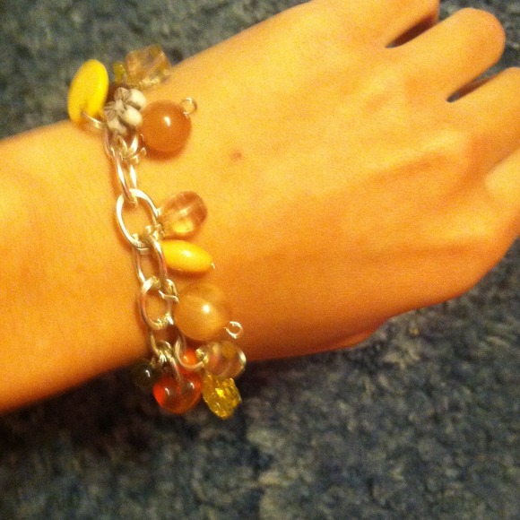 Charm bracelet w/orange, yellow, red charms