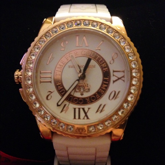 Juicy Couture gold and white jelly timepiece.