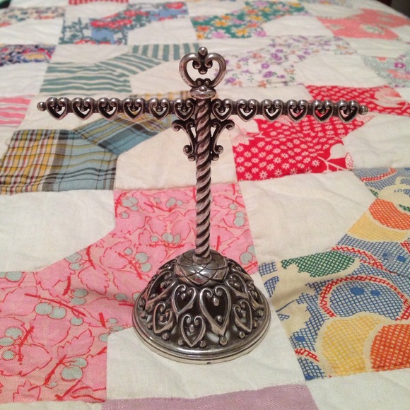 Earring tree and silver earrings.