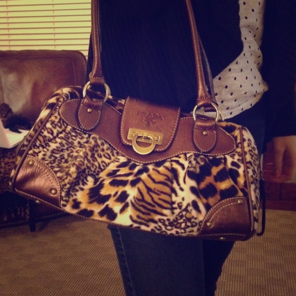 Prada Handbag. VS bracelet.
