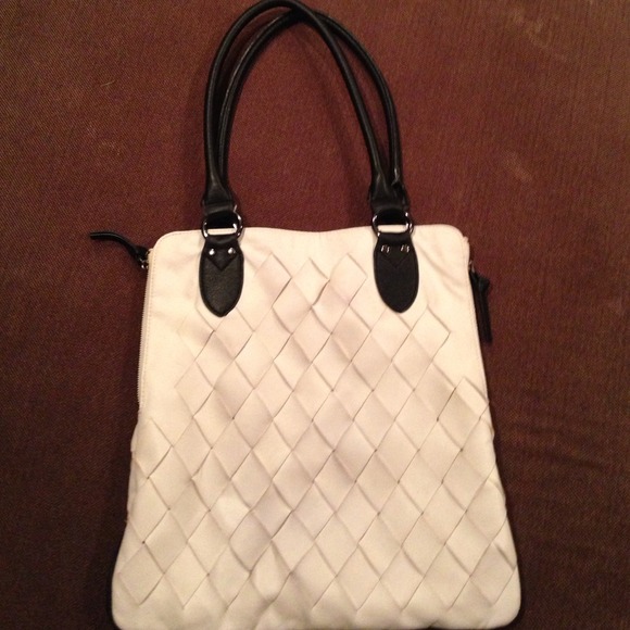 White woven handbag with black trim