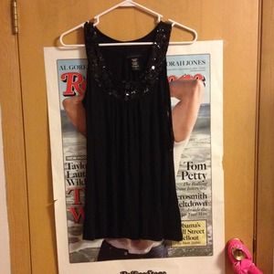 Black flowy shirt with sequin neck.