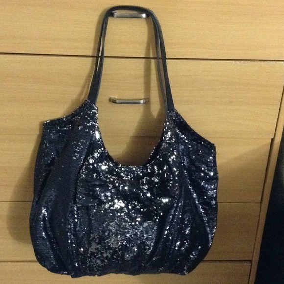 black purse with 🎀