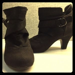 Black buckles booties
