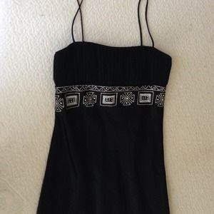 Beautiful floor-length gown. Never worn.