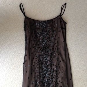 Floor length gown. Beautiful. Exposed back.