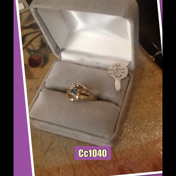 14k gold ring with diamonds..
