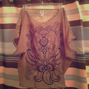 Beautiful sheer and lace stitched top!