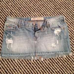 Destroyed denim mini skirt
