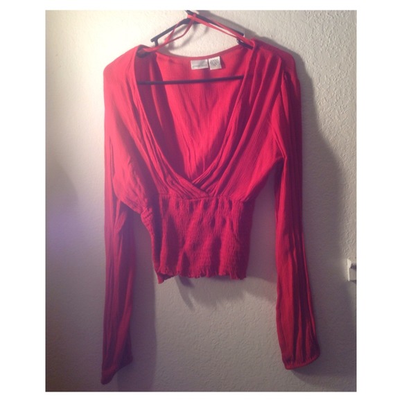 Red low v-cut shirt.