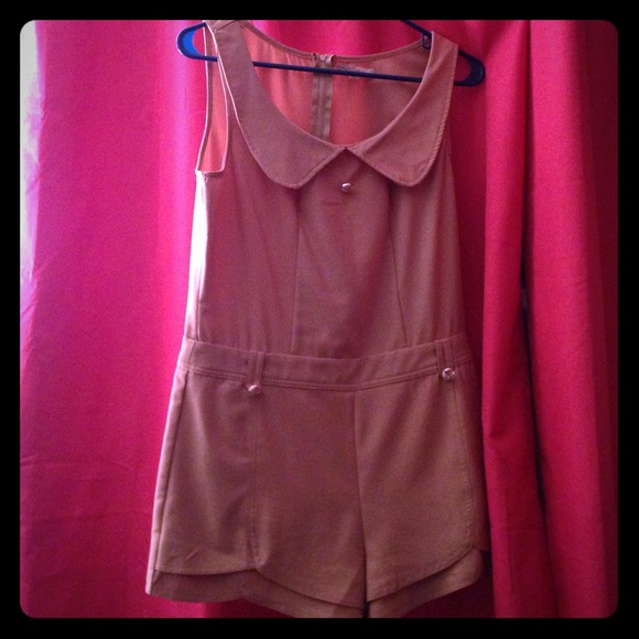 Adorable pink romper! With scalped trim!