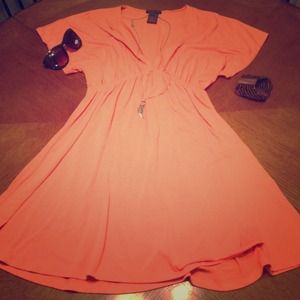 Orange knee length dress