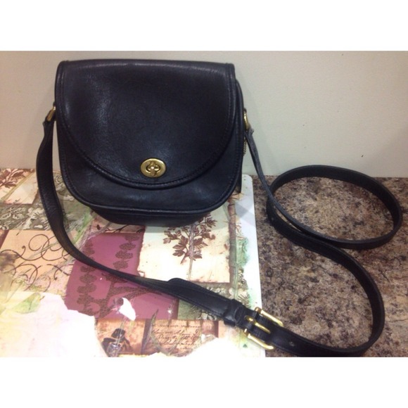 Leather cross body coach purse.