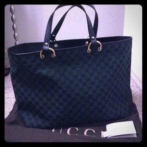 Gucci green monogram canvas handbag