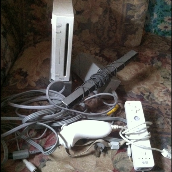 Wii! Comes with all cables & controller....