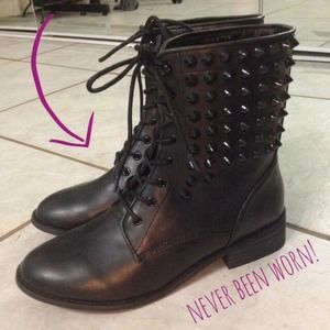 Black boots with spikes