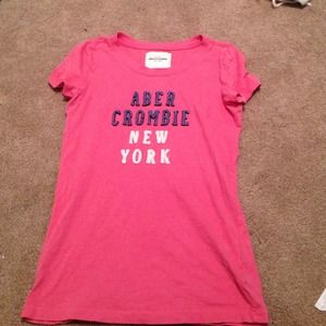Salmon pink Abercrombie shirt.