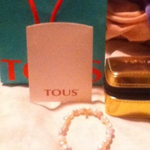 Authentic tous pearl bracelet with gold bear