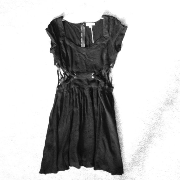 A black cutout string edgy dress