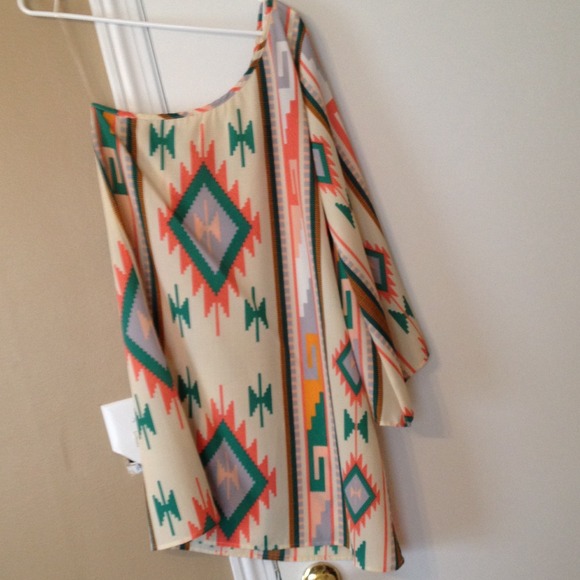 One shoulder dress or top.