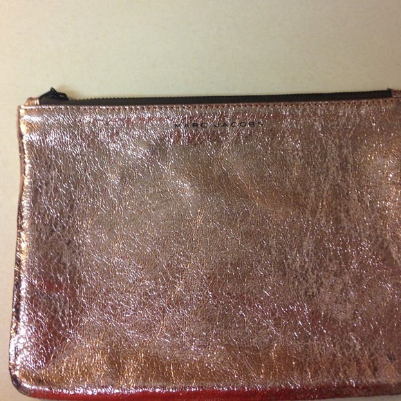 Marc Jacobs Rose gold metallic clutch.