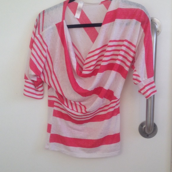 Half sleeve shirt with a flare front.hot pink