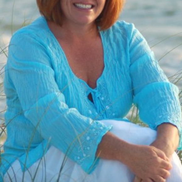 Turquoise long sleeved top.