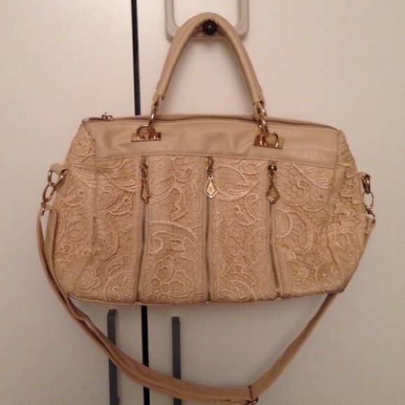 Beige lace handbag with gold zippers