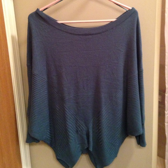 Teal "poncho" top.