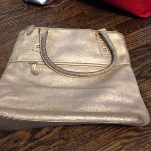 Gold metallic j crew tote.