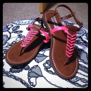 Brown sandals with bright pink detail