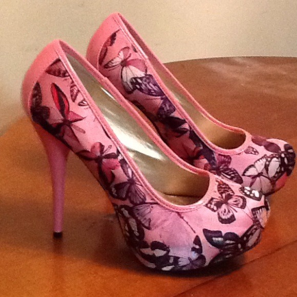 Pink butterfly pumps