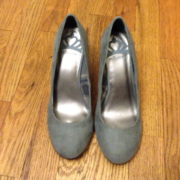 Gray wedge pump and gunmetal bracelet.
