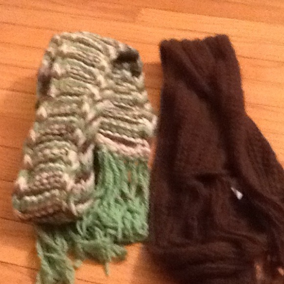 Two long skinny winter scarves.