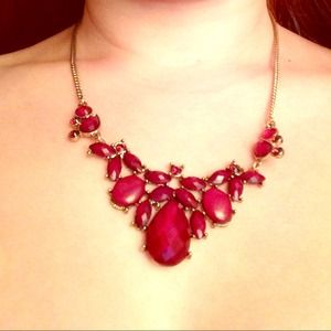 Wine colored necklace.