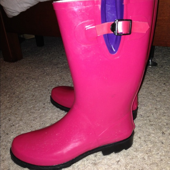 Bright pink rain boots