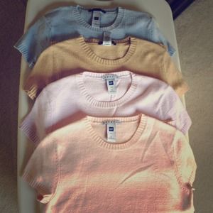 Sweaters: light blue, beige, lavender & pink.