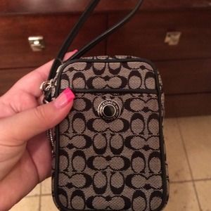 Coach phone pouch.