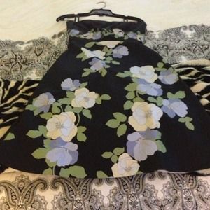 Black dress with purple and yellow flowers.